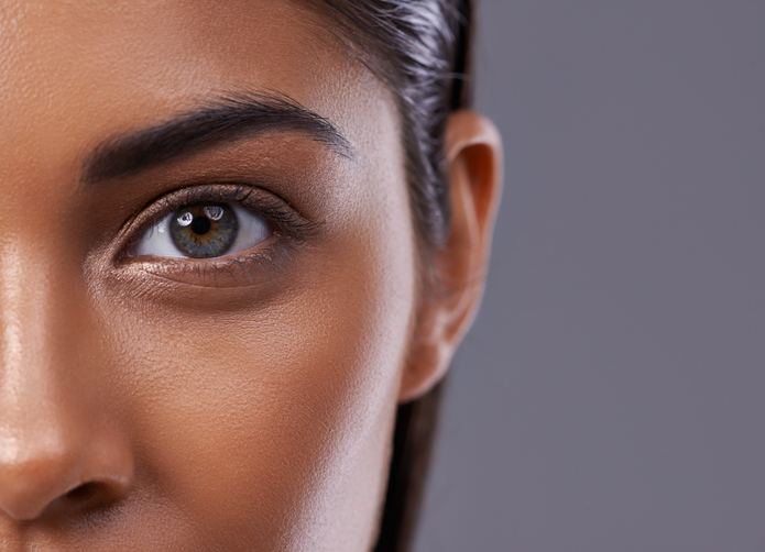 Closeup portrait of a beautiful young woman in the studio